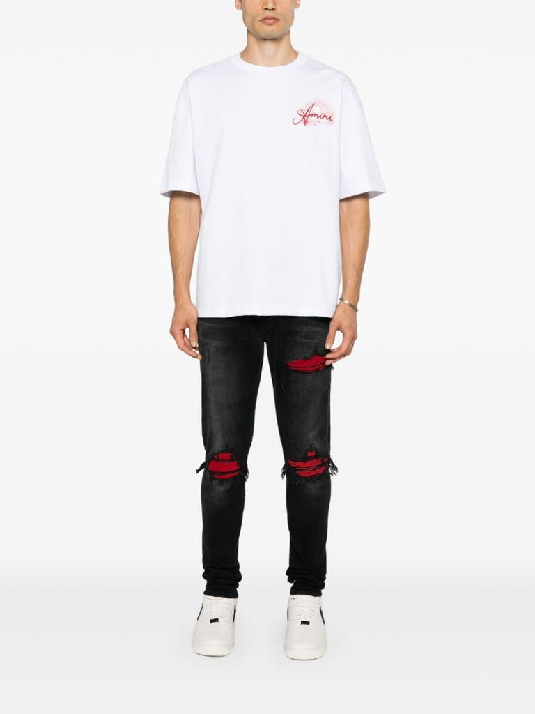 Black Mx1 Suede Skinny Jeans