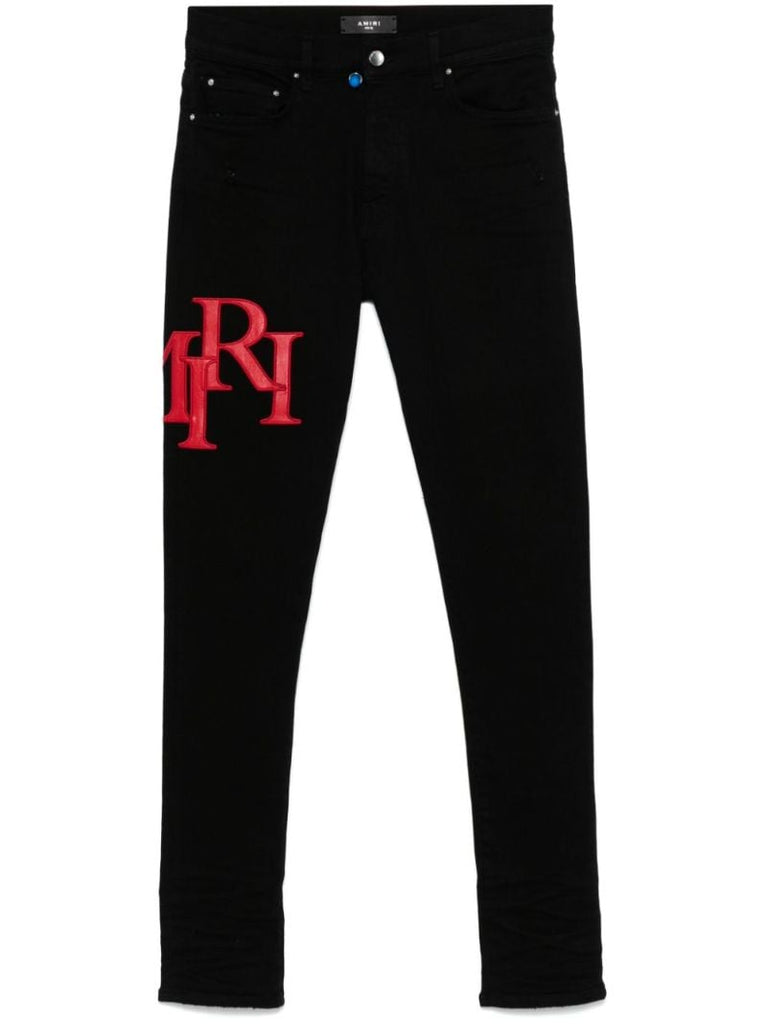 Black Staggered Jeans