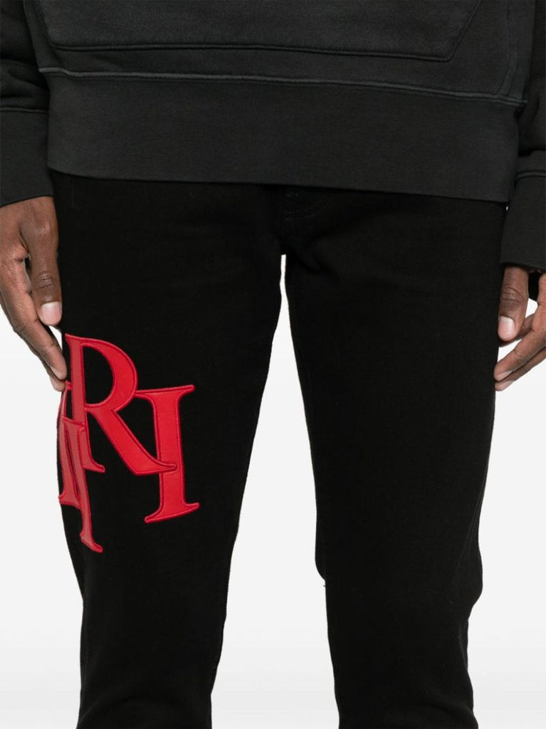 Black Staggered Jeans