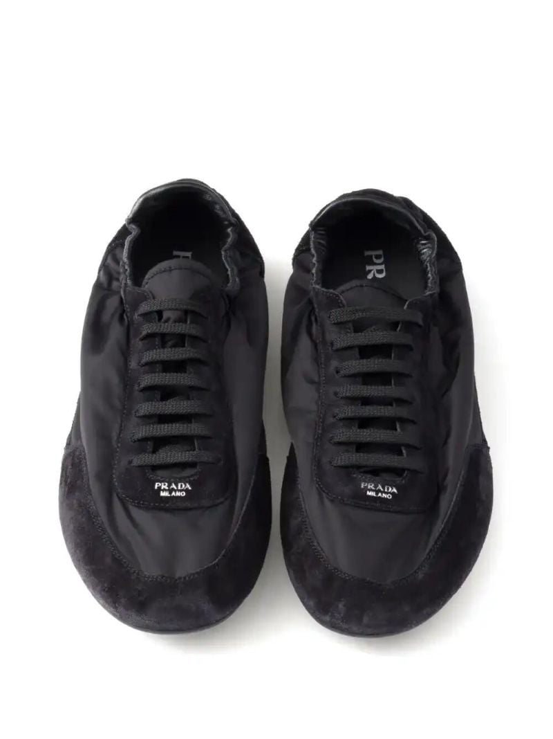 Black Collapse Sneakers