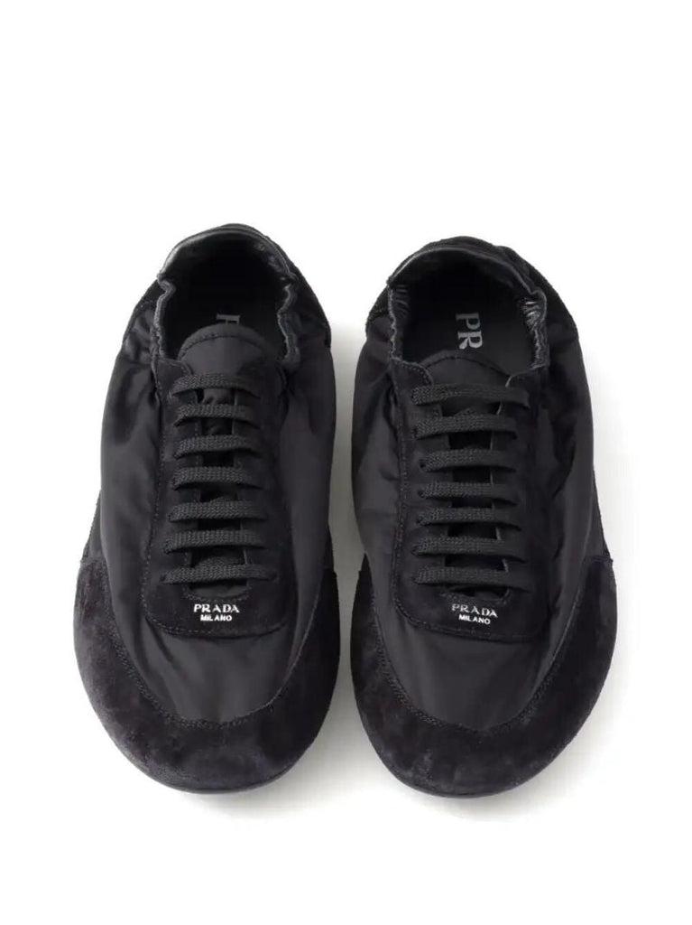 Black Collapse Sneakers
