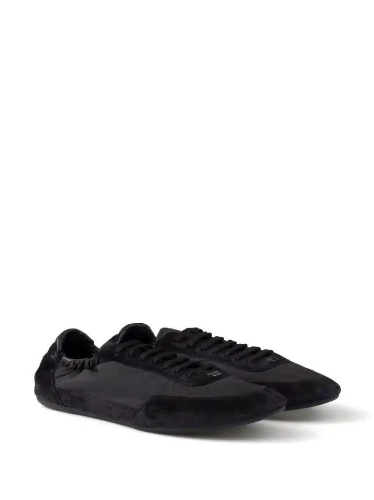 Black Collapse Sneakers